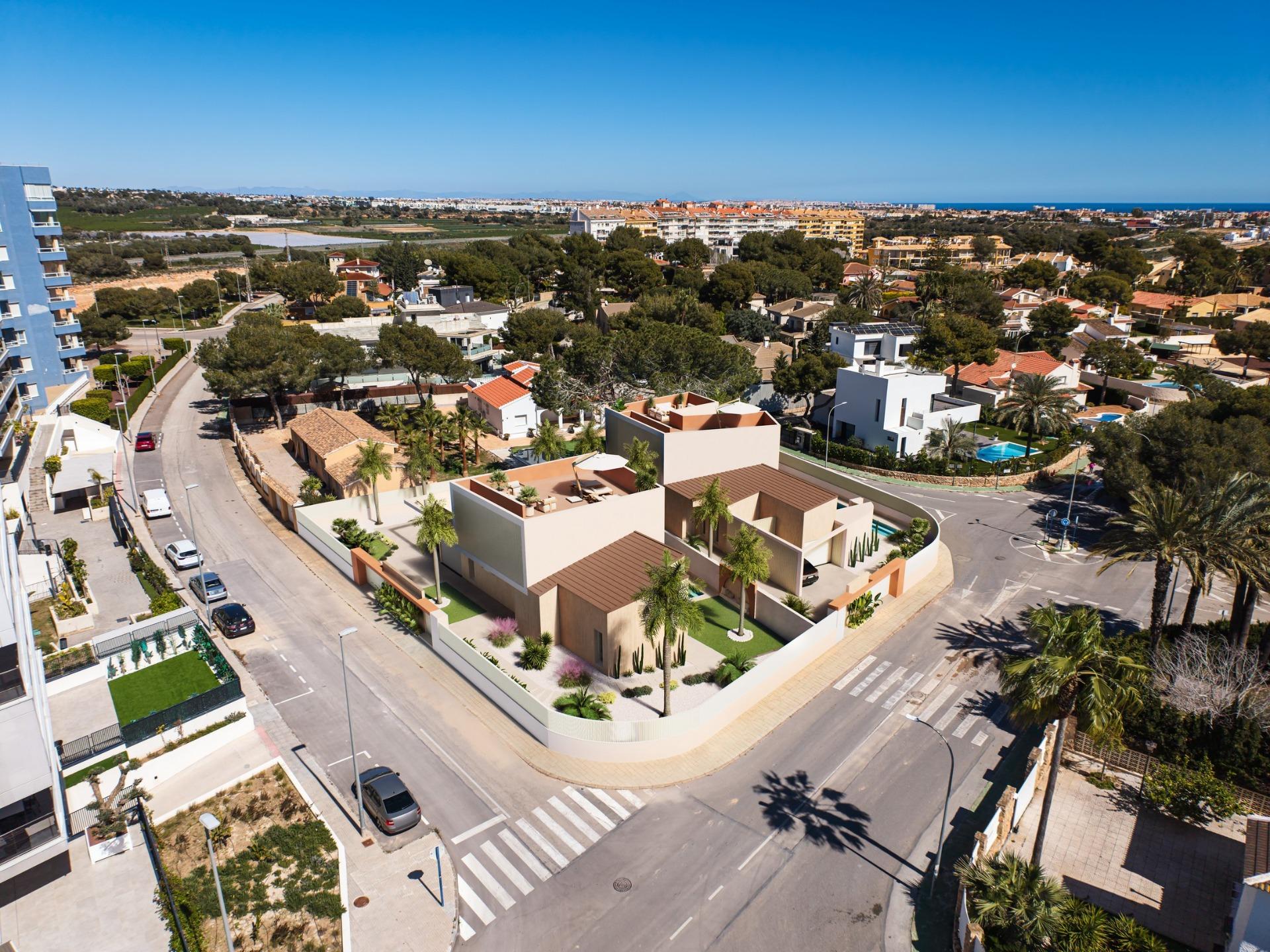 Villa en Venta en Orihuela Costa, Villas de lujo en Orihuela Costa, Alicante. Obra nueva con vistas al mar, 4 hab/4 baños. Cerca de playas y golf. ¡Invierte en tu paraíso!